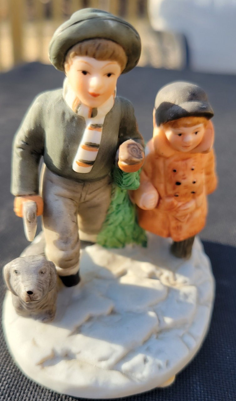 Vintage Norman Rockwell BRINGING HOME THE CHRISTMAS TREE Figurine 1983