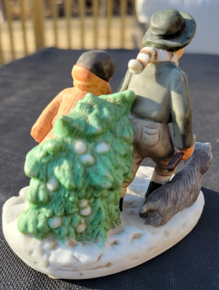 Vintage Norman Rockwell BRINGING HOME THE CHRISTMAS TREE Figurine 1983