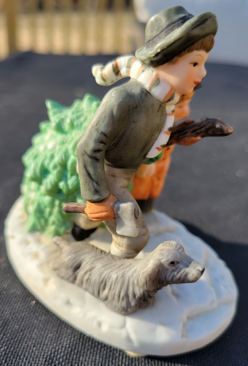 Vintage Norman Rockwell BRINGING HOME THE CHRISTMAS TREE Figurine 1983