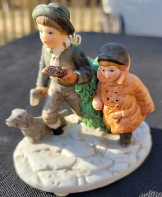 Vintage Norman Rockwell BRINGING HOME THE CHRISTMAS TREE Figurine 1983
